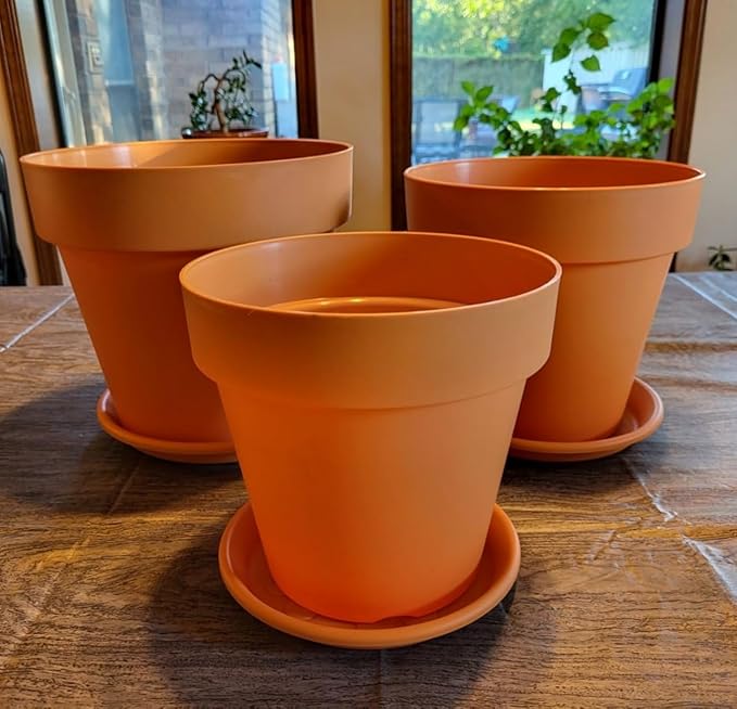 RooTrimmer 3-Pack 8/9/10 Inch Plastic Plant Pots with Saucers – Durable BPA-Free Planters with 21 Drainage Holes, Raised Bottom Breath and Bottom Watering Design for Indoor & Outdoor – Orange