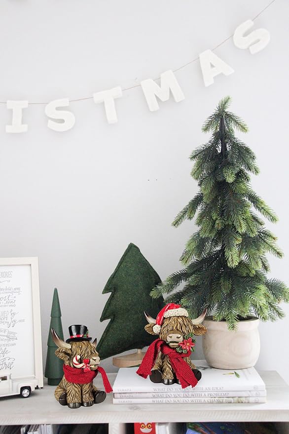 Holiday Scottish Highland Cows - Set of 2 | Resin Home Decor with Christmas Santa Hat Accents | Seasonal Xmas Decor for Centerpiece, Mantel, Kitchen, Dining Room, and More | 5 ¼ inches tall